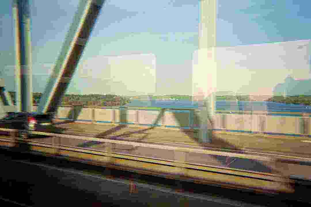 The Lillebælt seen from inside a train passing it. With strong jpg-compression artifacts.